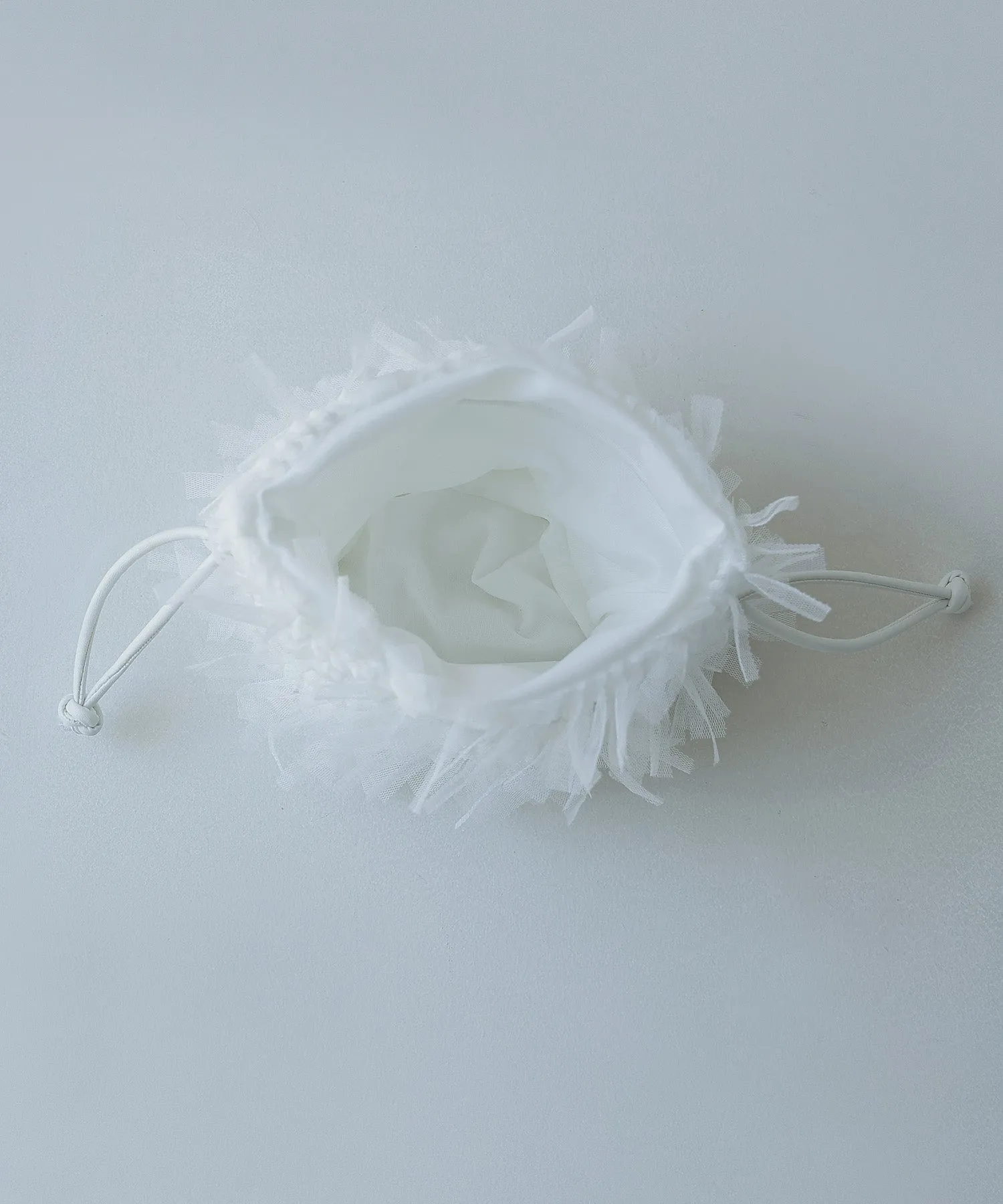 Tulle fringe drawstring mini bag